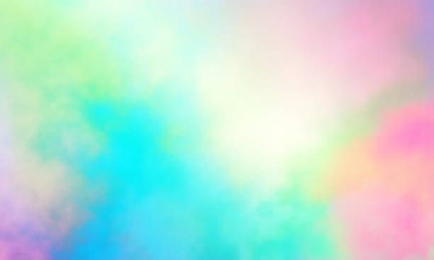 istock Colorful watercolor background of abstract sunset sky with puffy clouds in pastel rainbow colors of pink blue yellow orange and purple 2239570383
