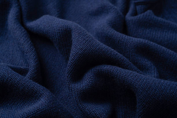 istock Navy blue merino wool sweater texture as background. Top view. 2239571470