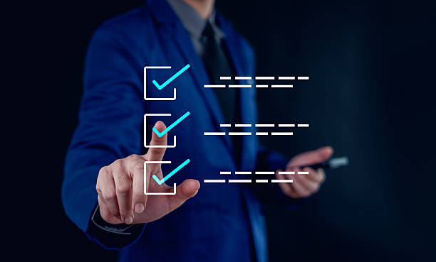 istock Businessman mark checkboxes, Survey form, check marks on checklist,Checklist concept. 2239572734