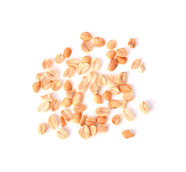 istock Heap of Roasted peanuts group isolated on white top view 2239574376