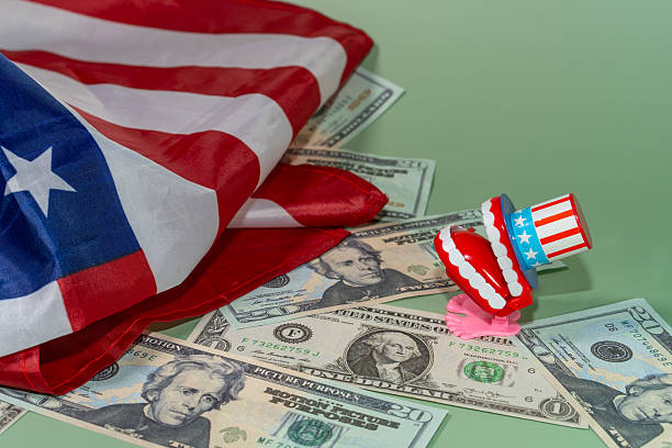 istock Financial Crisis: US Flag and Money 2239578498