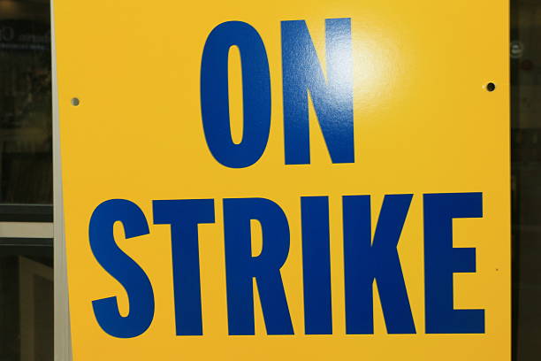 Belfast, Northern Ireland - April 1, 2024: \n Detail from a clearance sign outside a retailer's store advertising that 'new discount in stock every week'