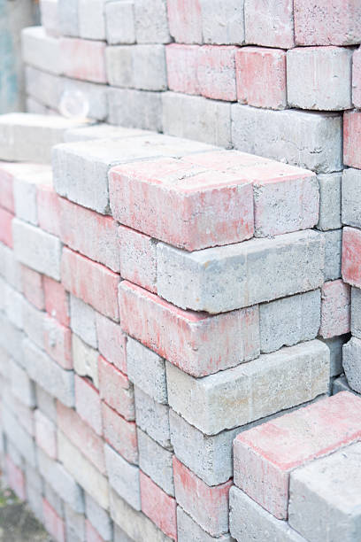 istock Stack of Concrete Paving Stones Ready for Outdoor Construction Project 2239586497