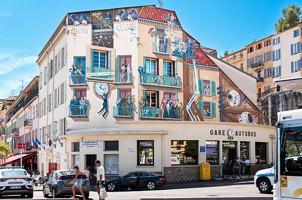 Cannes, France - August 28, 2025: Les Murs Peints - Cinema Cannes. Beautiful painted mural at a bus station as a tribute to the film industry and some of the most recognized movies in history.