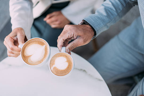 istock Couple having coffee at a cafe. 2239587573