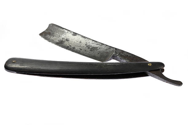 istock vintage straight razor isolated on white background 2239589397