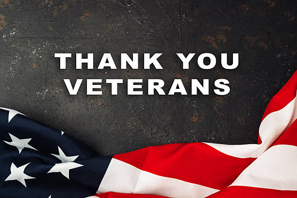 istock Flag with the words Thank You Veterans written below it 2239593742