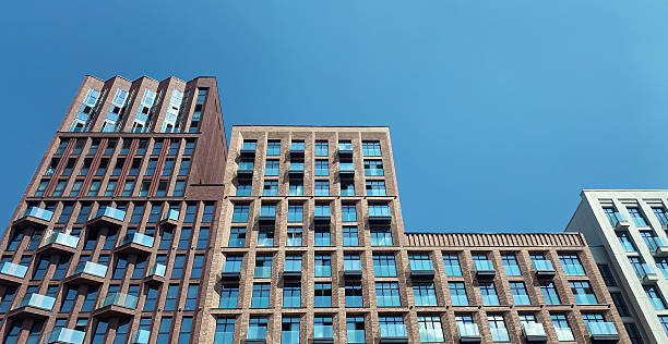 istock Architecture and real estate, modern residential apartment building with large panoramic windows 2239604698