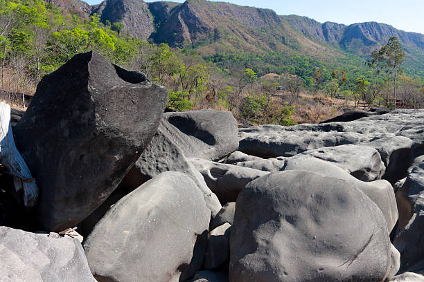 The unusual dark rock formation at the Vale da Lua in Chapada dos Veadeiros near the city of Alto Paraiso, Brazil