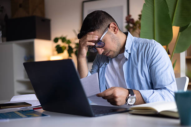 istock Stressed young businessman 2239618038