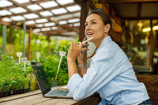istock A Thoughtful and Professional Individual Engaged in Their Work Inside a Greenhouse Setting 2239619040