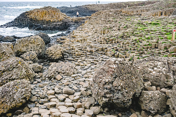 The nature hexagon columns at the beach called the Giant's Causeway, County Antrim, Northern Ireland. Selective focus, basalt formation.