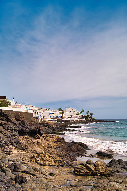 istock White Villas and Rocky Seashore Lanzarote 2239624551