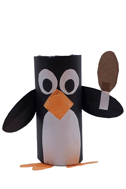 istock Cardboard penguin craft holding an ice cream 2239627524