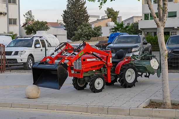 istock Red mini tractor on a Cyprus street in summer 2239627701