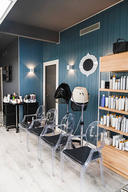 istock Modern hairdressing salon interior with styling chairs 2239628015