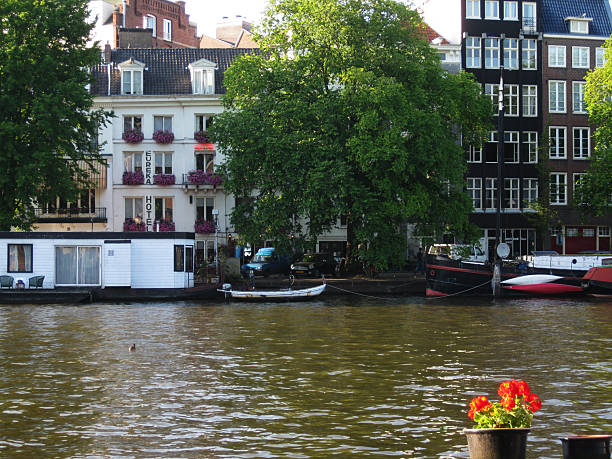 Amsterdam, Netherlands - 02/23/2010: Amsterdam Canal Buildings and boats