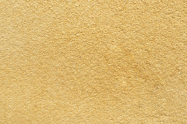 istock Smooth texture of beige wall surface showcasing warm color tones and subtle patterns ideal for backgrounds and design projects 2239633951