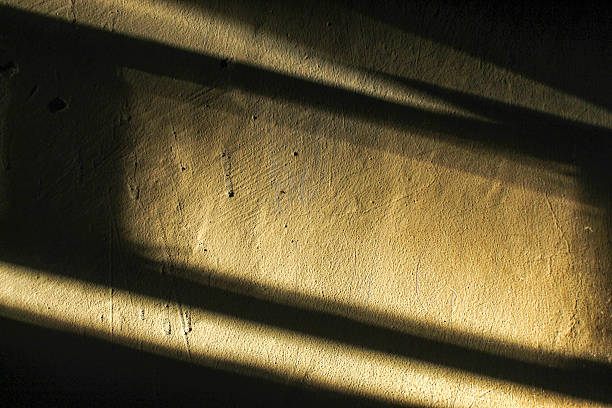 istock natural light reflection background on a rough textured golden brown surface 2239644235