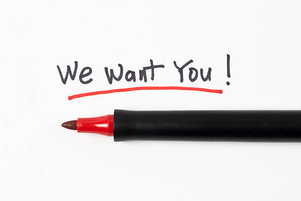 istock We want you handwriting text on white paper with red marker pen 2239646843