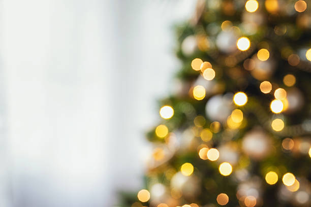 istock Defocused Christmas Tree at Home 2239646909