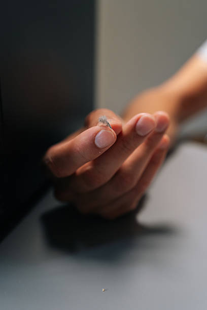 istock Close-up of male hand holding dust bunny after cleaning dusty computer case, emphasizing necessity of regular maintenance for ensuring optimal performance 2239648242