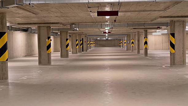 istock This is a spacious underground parking lot equipped with various essential safety features 2239651333