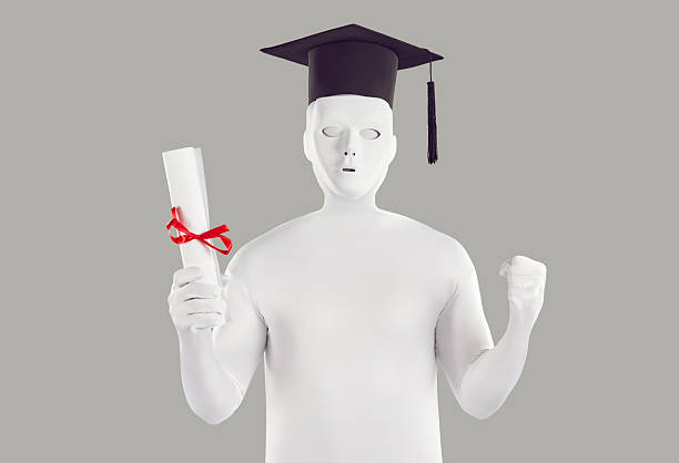 Unknown person dressed in white leotard and mortarboard celebrating success. Portrait of graduation man in full body white suit, black cap holding diploma, certificate on isolated studio background