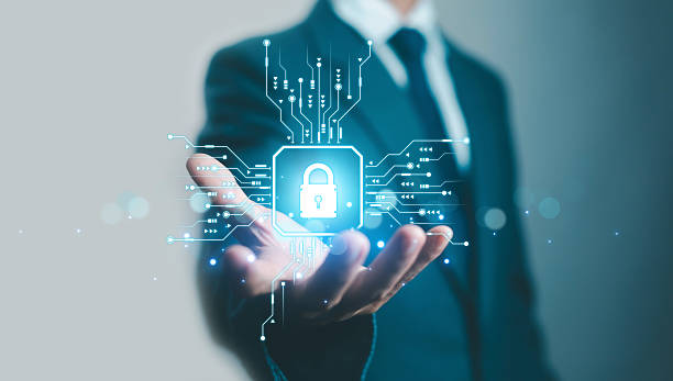 istock Businessman holding digital padlock icon with circuit connections, representing cybersecurity, data encryption, secure technology, and online information protection in modern digital business systems. 2239660524