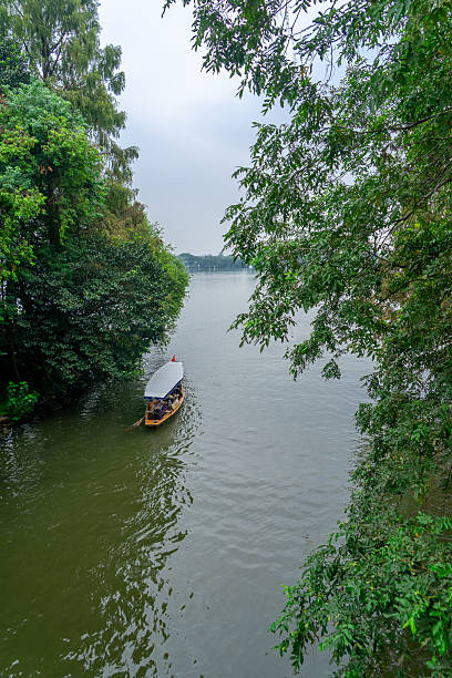 istock Traditional Boat on a Calm River 2239660542
