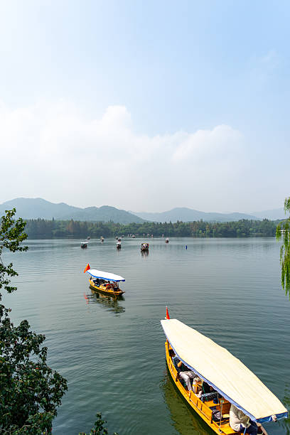 istock Traditional Boat on a Calm River 2239660789