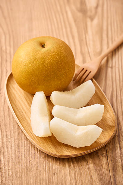 istock Sliced Akizuki Japanese Asian Pear 2239662121