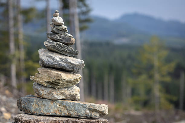 Pyramid of stones. Selective focus with copy space. Travel and hiking concept.