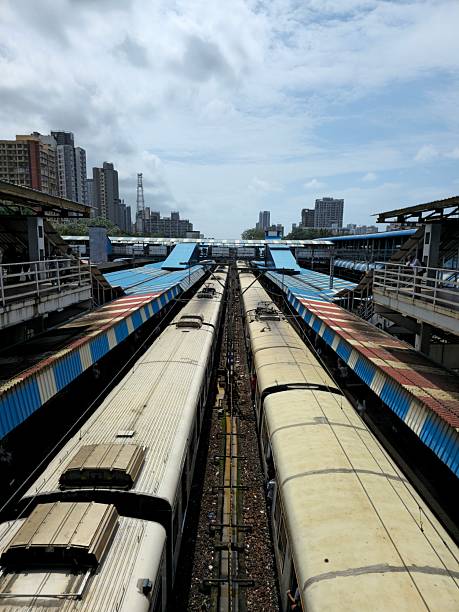istock Local train passing though station elevated view located in rural India. The shot is taking from the bridge. 2239664399
