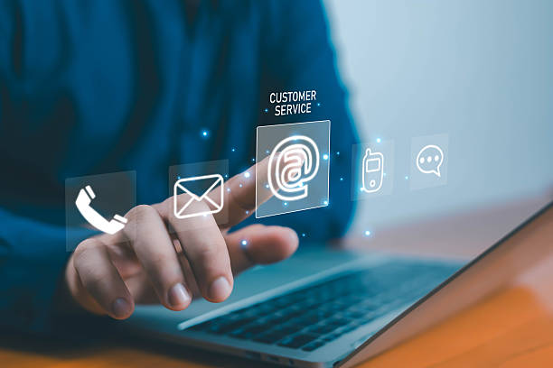 istock Person using laptop and touching virtual contact icons representing email, phone, and chat customer service. Concept of online communication, digital marketing, and business technology connection. 2239665994