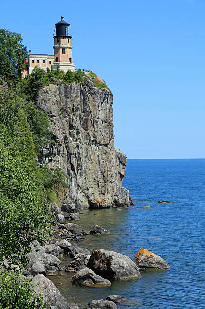 istock The cliff and the lighthouse vertical - Split Rock Lighthouse 2239667012