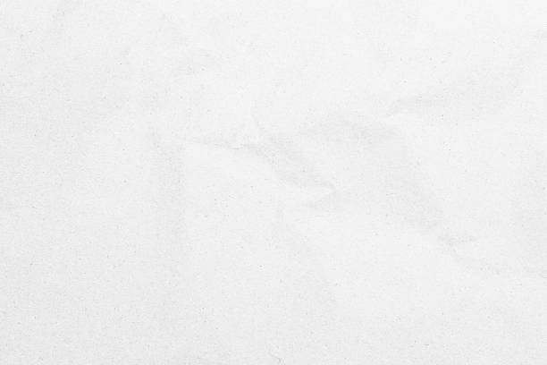 istock White recycled craft paper texture as background with copy space for text. 2239669318