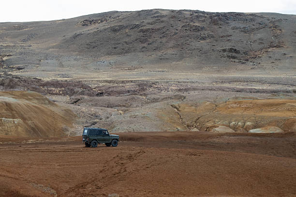 istock Off-Road Vehicle in Desert Landscape 2239672079