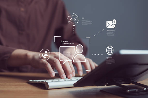 istock Business professional using keyboard with AI chatbot and messaging icons on virtual interface, for efficient digital communication in modern business 2239681704