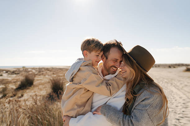 istock Catching some winter sun on the local beach 2239689994