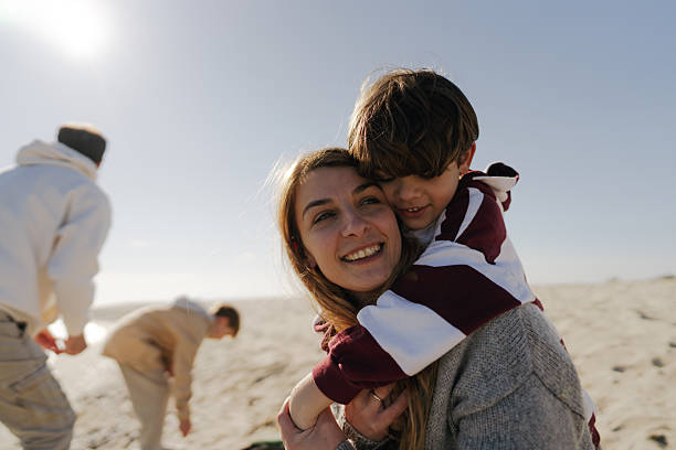 istock Catching some winter sun on the local beach 2239690009