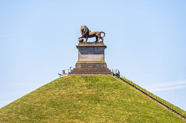 A statue of a friendly looking lion on the memorial to Admiral Lord Nelson in St Pauls Cathedral London.The lion has long been used as a symbol for the United Kingdom.