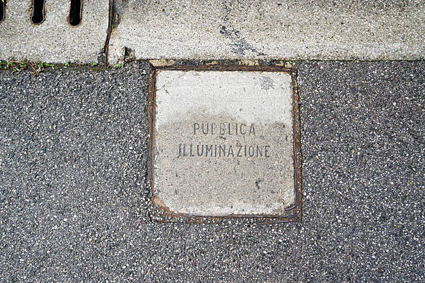 Tresigallo (FE) October 5, 2025.  the manhole of the public lighting in a street in the city centre