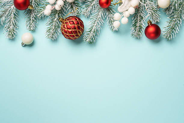 istock Christmas present with decor on blue with space for design. 2239698744