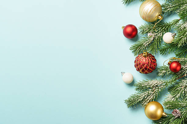 istock Christmas present with decor on blue with space for design. 2239698745