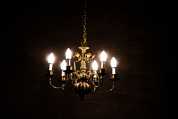 A beautiful chandelier glowing in the dark