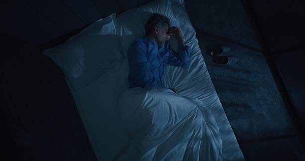 istock Man Suffers From Insomnia and Obsessive Thoughts 2239703389