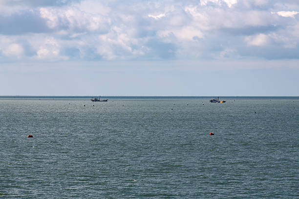 istock idyllic seascape on a cloudy day 2239704321