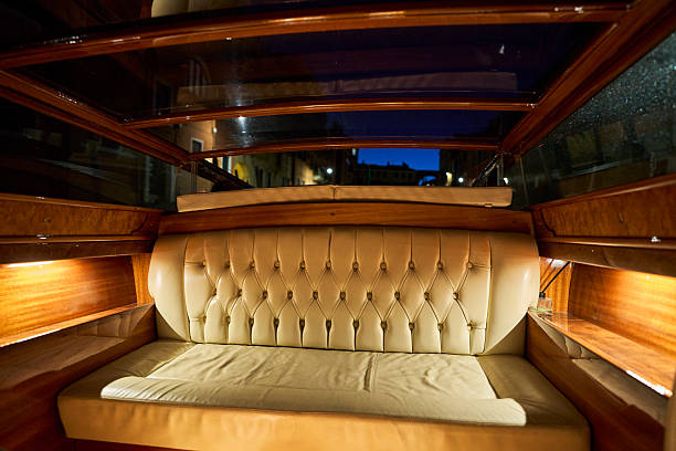 istock Luxurious leather seating inside a wooden boat. 2239705553