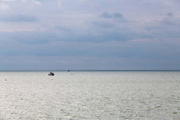 with fishing boats on the calm sea
